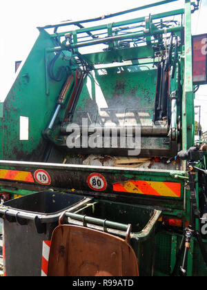 Waste trucks and bins at the market of Turin Stock Photo