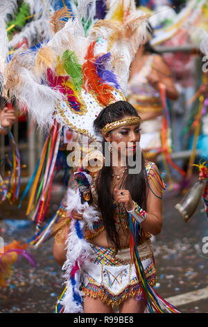Tobas dancers in colourful costumes performing at the annual Oruro Carnival. Stock Photo