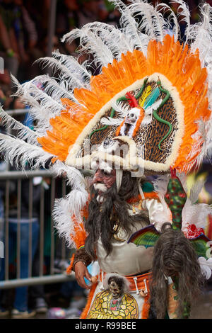 Tobas dancers in colourful costumes performing at the annual Oruro Carnival. Stock Photo