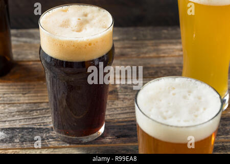 Refreshing Cold Craft Beer Assortment of IPA Lager and Stout Stock Photo