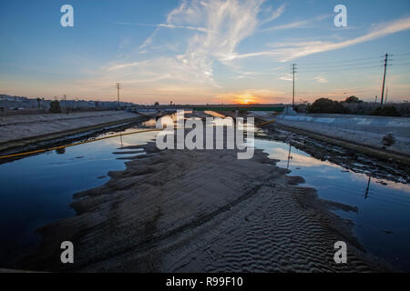Ballona Creek at low tide. Ballona Creek, once a meandering creek, is now a concreted nine-mile waterway that drains the Los Angeles Basin and watersh Stock Photo