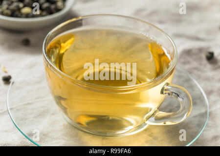 Organic Hot Oolong Tea on a Saucer Stock Photo