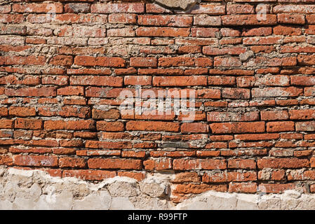 old plastered brick wall from the ruins of Ayutthaya Thailand background texture Stock Photo