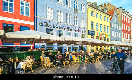 Copenhagen, Denmark - September 25, 2018: Scenic view of Nyhavn pier with colored buildings, ships, yachts and other boats in the Old Town. Stock Photo