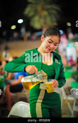 Chang girl serving beer at Central Festival Mall Pattaya Thailand Stock Photo