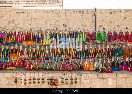 Rajasthani puppets (Kathputli) have been displayed on a street shop at Jaisalmer, Rajasthan. Kathputli is a string puppet, native to Rajasthan, India Stock Photo