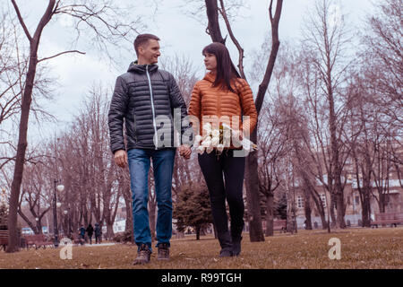 Date of middle aged Loving couple in spring sity park Stock Photo