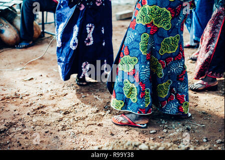 Women dancing in the mud. Multi Ethnic music party to celebrate western and developing countries cooperation. Bamako, Mali. Africa Stock Photo