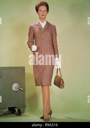 Custome by Edith Head. Original film title: MARNIE. English title: MARNIE. Year: 1964. Director: ALFRED HITCHCOCK. Stars: TIPPI HEDREN. Credit: UNIVERSAL PICTURES / Album Stock Photo