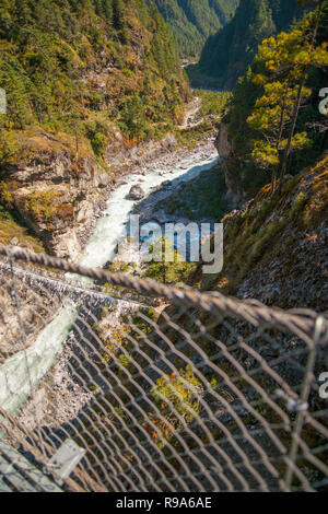 Suspension bridge on the way to Namche Bazar in Himalayas. Everest base camp trek in Nepal. Hillary bridge Stock Photo