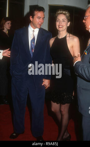 WESTWOOD, CA - MAY 19: Actress Sharon Stone and boyfriend Bill MacDonald attend the 'Sliver' Westwood Premiere on May 19, 1993 at Mann National Theatre in Westwood, California. Photo by Barry King/Alamy Stock Photo Stock Photo