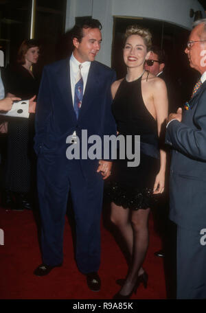 WESTWOOD, CA - MAY 19: Actress Sharon Stone and boyfriend Bill MacDonald attend the 'Sliver' Westwood Premiere on May 19, 1993 at Mann National Theatre in Westwood, California. Photo by Barry King/Alamy Stock Photo Stock Photo