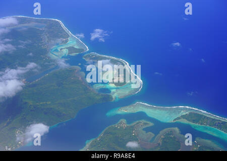 Aerial view of the island and lagoon of Huahine near Tahiti in French Polynesia, South Pacific Stock Photo