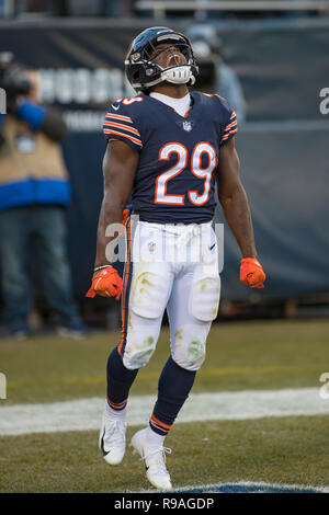 Chicago, IL, USA. 04th Dec, 2022. Chicago Bears #21 Darrynton Evans runs  past Packers #23 Jaire Alexander during a game against the Green Bay Packers  in Chicago, IL. Mike Wulf/CSM/Alamy Live News