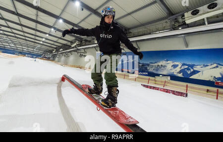 Bispingen, Germany. 22nd Dec, 2018. Ole Lindhorst rides his snowboard over an obstacle in the Snow Dome. Credit: Philipp Schulze/dpa/Alamy Live News Stock Photo