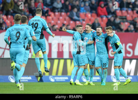 Nürnberg, Germany. 22nd Dec 2018. Soccer: Bundesliga, 1st FC Nuremberg - SC Freiburg, 17th matchday in Max Morlock Stadium. Freiburg's Christian Günter (3rd from right) cheers his goal to 0:1 with his team-mates. Photo: Timm Schamberger/dpa - IMPORTANT NOTE: In accordance with the requirements of the DFL Deutsche Fußball Liga or the DFB Deutscher Fußball-Bund, it is prohibited to use or have used photographs taken in the stadium and/or the match in the form of sequence images and/or video-like photo sequences. Credit: dpa picture alliance/Alamy Live News Stock Photo