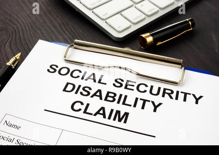Social security disability benefits claim and pen. Stock Photo
