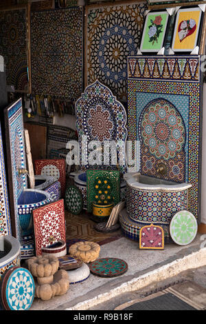 Morocco, Tangier, Medina Bab el Marsa, shop selling crafts decorated with traditional Zellij geometric tiles Stock Photo