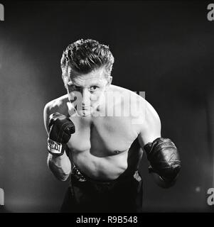 Original film title: CHAMPION. English title: CHAMPION. Year: 1949. Director: MARK ROBSON. Stars: KIRK DOUGLAS. Credit: UNITED ARTISTS / Album Stock Photo