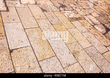 Ancient paving stones on the streets in Jerusalem Old Town, Israel Stock Photo