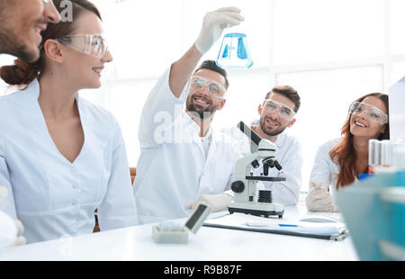 group of young workers are working in biochemistry lab, Stock Photo