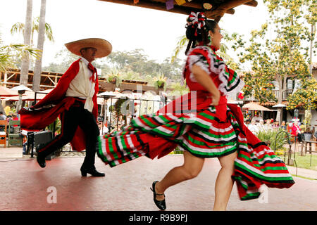 USA, California, San Diego, several members of Grupo Folklorico colorfully dance at the Fiesta de Reyes in Old Town Stock Photo