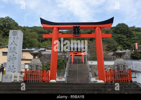 Nagasaki, Japan - October 22, 2018: Entrance torii and high stairs to the Yasaka shrine in Nagasaki Stock Photo