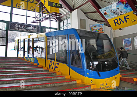 ZAKOPANE, POLAND - DECEMBER 31, 2010: The cable car (in move) rides to the peak of Gubalowka (1126 m n.p.m.). The funicular was built in 1938 Stock Photo