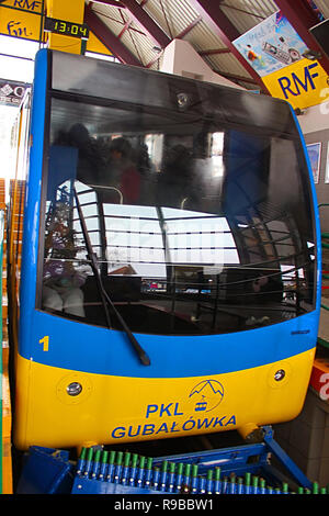 ZAKOPANE, POLAND - DECEMBER 31, 2010: The cable car rides to the peak of Gubalowka (1126 m n.p.m.). The funicular was built in 1938 Stock Photo