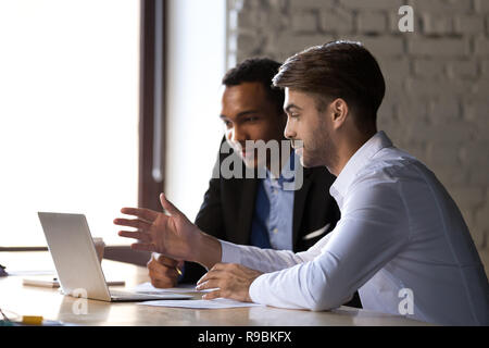 Financial advisor insurer speaking consulting african client loo Stock Photo