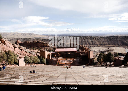 Symmetrical Landscape Portrait of Red Rock Amphitheater Stands and Stage Facing Beautiful Mountain Beautiful Mountain Background on Perfect Sunny Day Stock Photo