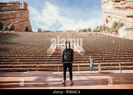 Symmetrical Landscape Portrait of Red Rock Amphitheater Stands and Stage Facing Beautiful Mountain Beautiful Mountain Background on Perfect Sunny Day Stock Photo