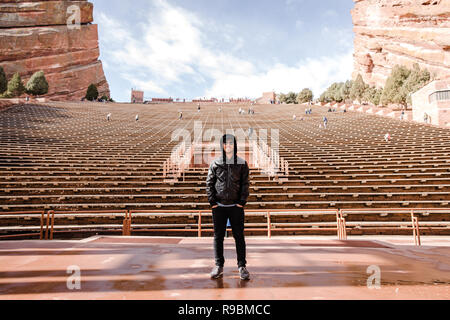 Symmetrical Landscape Portrait of Red Rock Amphitheater Stands and Stage Facing Beautiful Mountain Beautiful Mountain Background on Perfect Sunny Day Stock Photo