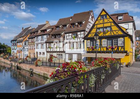 View of the historic town of Colmar, also known as Little Venice, with traditional colorful houses near by the river Lauch, Colmar, Alsace, France. Stock Photo