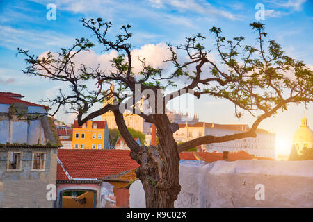 Scenic Alfama lookout at sunset with Sao Vicente de Fora a monastery on the background Stock Photo