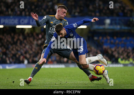 Leicester City's Jamie Vardy (left) and Chelsea's Jorginho battle for the ball during the Premier League match at Stamford Bridge, London. Stock Photo
