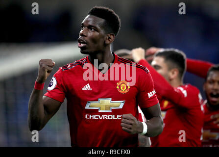 Manchester United's Paul Pogba celebrates the result at the end of the Premier League match at the Cardiff City Stadium. Stock Photo