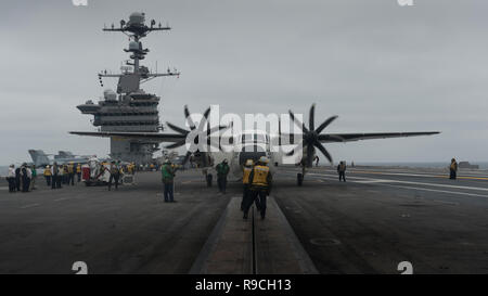 An E-2C Hawkeye prepares to take off from the flight deck of USS Dwight ...