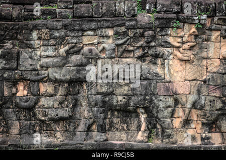 Carvings on the sandstone wall at the Terrace of Elephants at Angkor Thom, Siem Reap, Cambodia Stock Photo