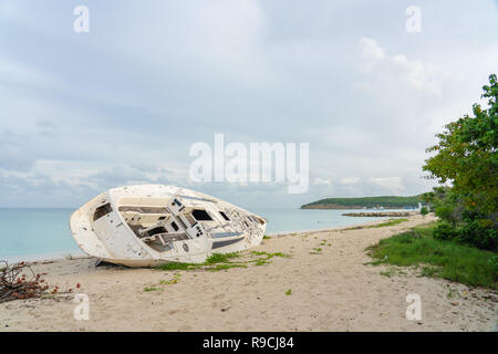 Shipwreck on the beach in Antigua Stock Photo