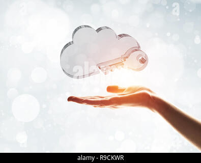 Cloud computing concept with glass symbol shown in hand Stock Photo