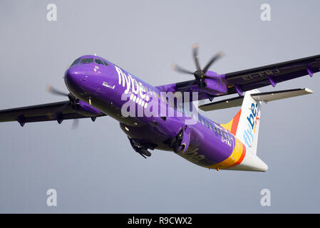 flybe ATR 72 -600 EI-FMJ airliner plane taking off at London Southend Airport, Essex, UK. Stobart Air. Undercarriage retracting Stock Photo