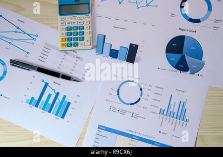 Top view business analysis graph Calculator and pen Stock Photo