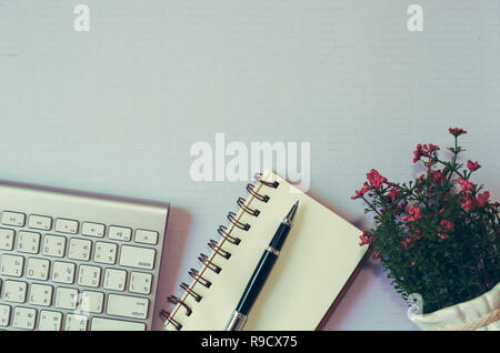 Top view keyboard cpmputer and book and pen on the white background. copy space Stock Photo