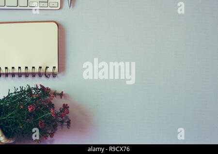 Top view keyboard cpmputer and book and pen on the white background. copy space Stock Photo