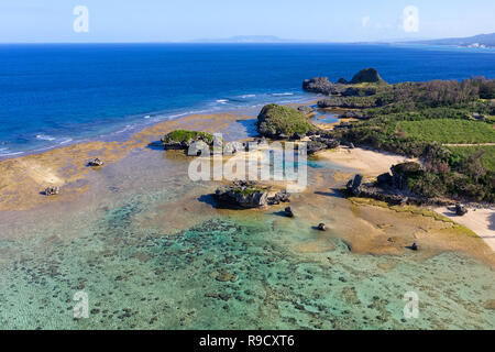 Aerial drone view of beautiful tropical beaches, small islands and surrounding coral reef, Beach 51. Zanee Hama, Cape Maeda, Okinawa, Japan Stock Photo