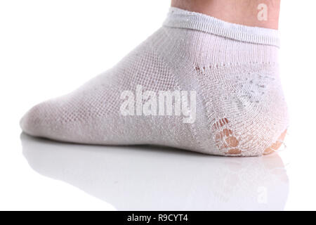 Ripped white sock on male leg isolated Stock Photo