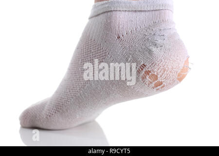 Ripped white sock on male leg isolated Stock Photo