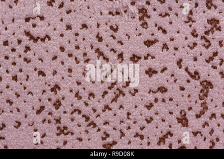 Mottled fabric texture in light brown hue. Stock Photo