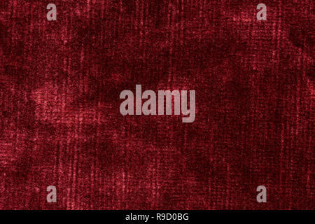 Velvet background in adorable saturated red tone. Stock Photo